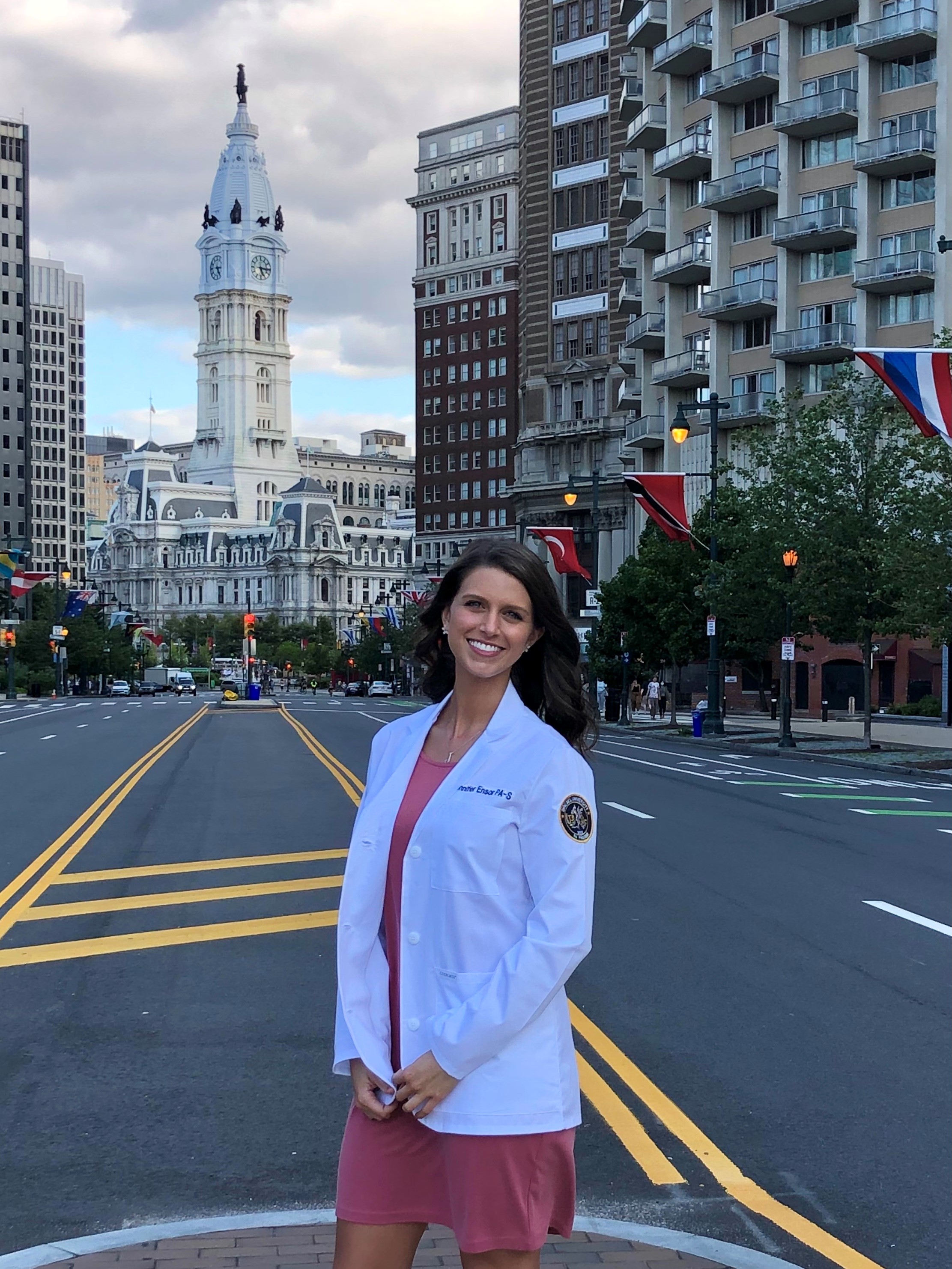 PA student Jen Ensor with Philadelphia City Hall in the background